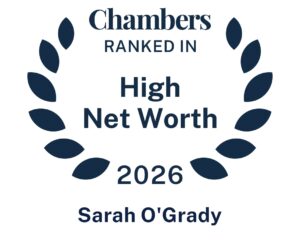 Dark blue text inside a laurel wreath reads: Chambers Ranked In High Net Worth 2026 Sarah O’Grady. White background.