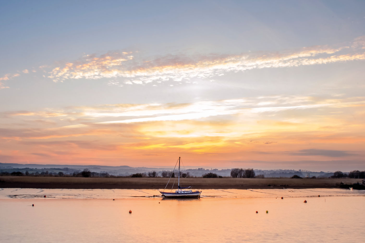 Boat on river in sunset