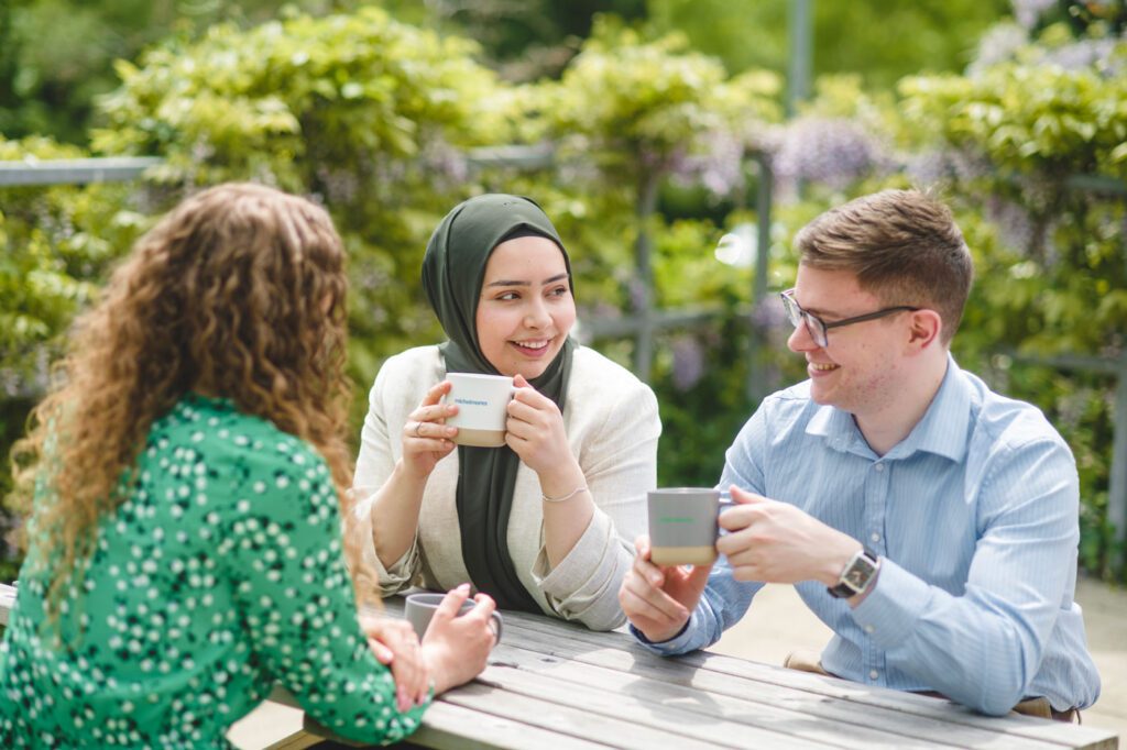 co-workers enjoying a coffee