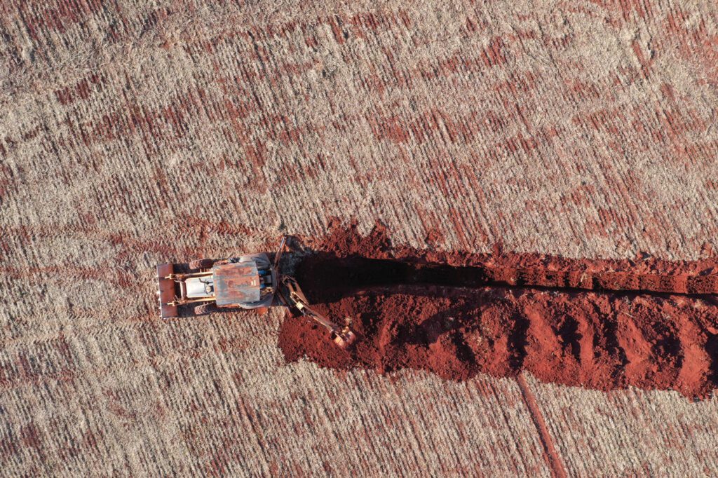 Digger in field