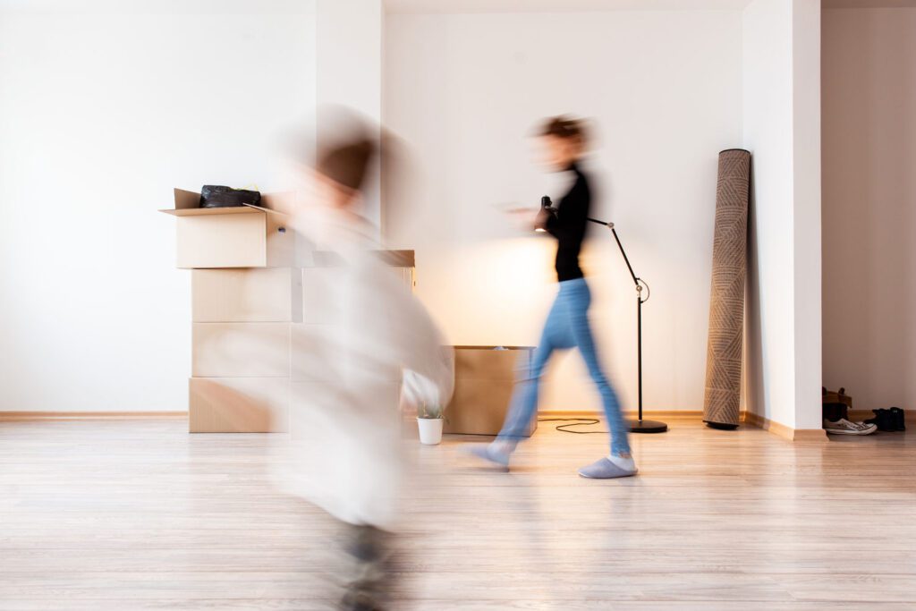 Mother and son moving in the new apartment