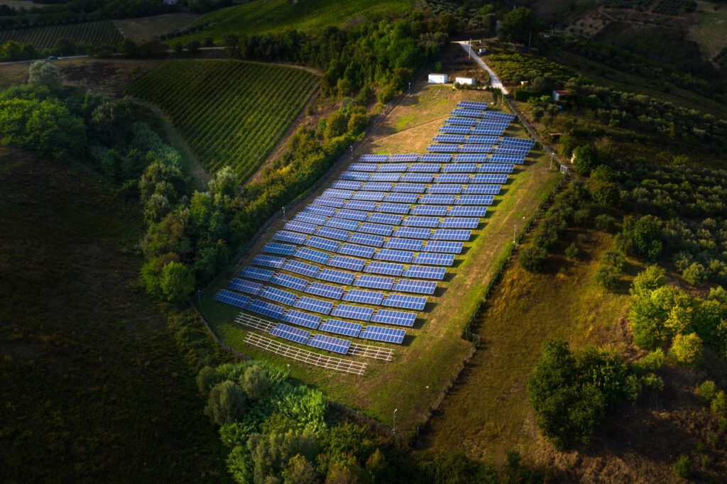 Solar panels fields on the green hills