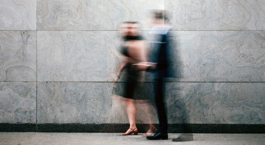 Two business people walking on downtown street