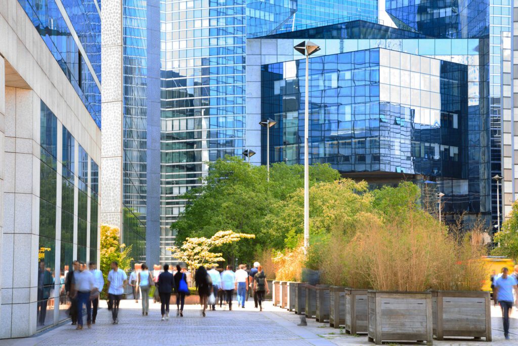 Business People Walking in Financial District, Blurred Motion