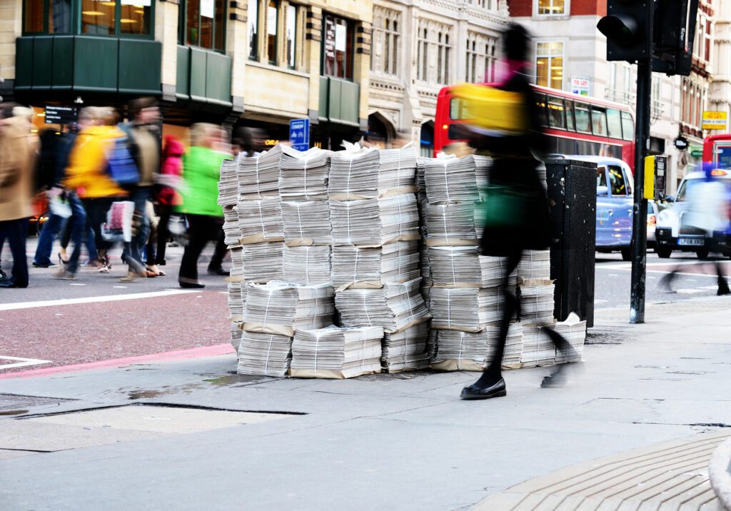 Newspapers piled up on London street