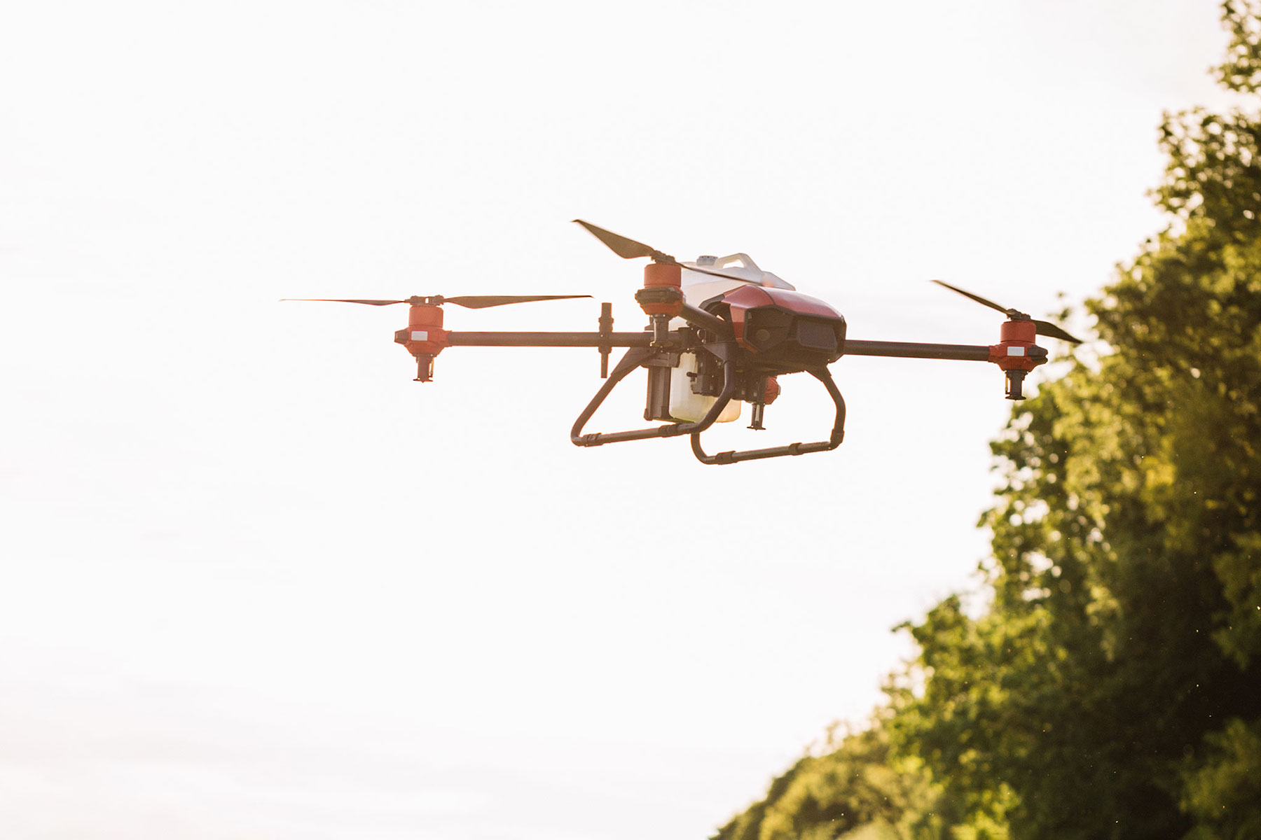 Drone flying over farmland