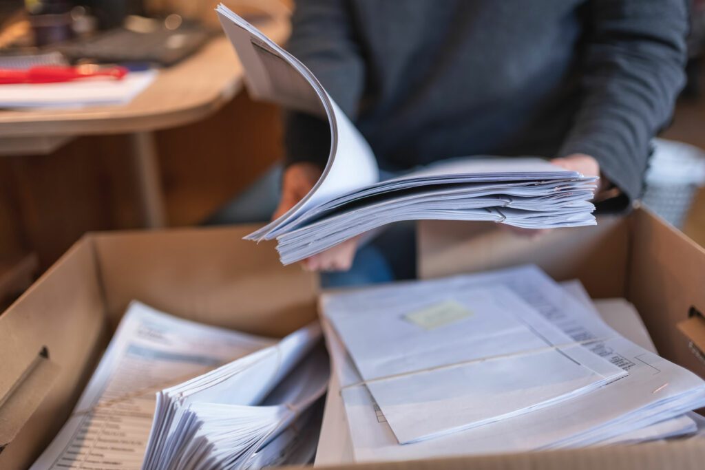 Person raiding office documents