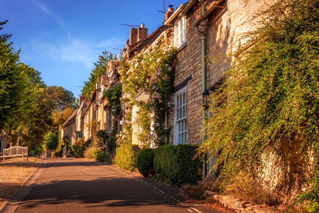 Row houses along a main road in the Cotswold town of Burford