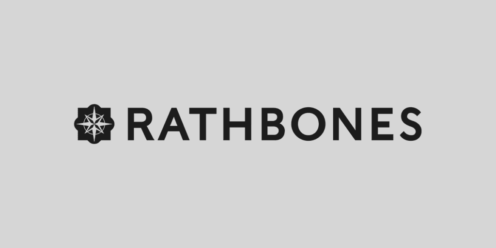 The image shows the word RATHBONES in bold black letters next to a geometric star logo on a light grey background, evoking the professional spirit often seen at events like the Michelmores 5k Charity Run.