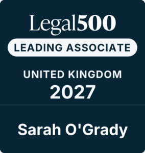 Legal 500 badge showing LEADING ASSOCIATE UNITED KINGDOM 2027 Sarah O'Grady on a dark blue background.