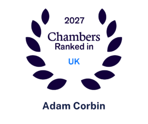 Adam Corbin is listed in the 2027 Chambers UK rankings, framed by a dark blue laurel wreath.