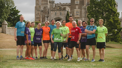 Michelmores relay delivers trophy to Powderham Castle for September’s 5k Charity Run
